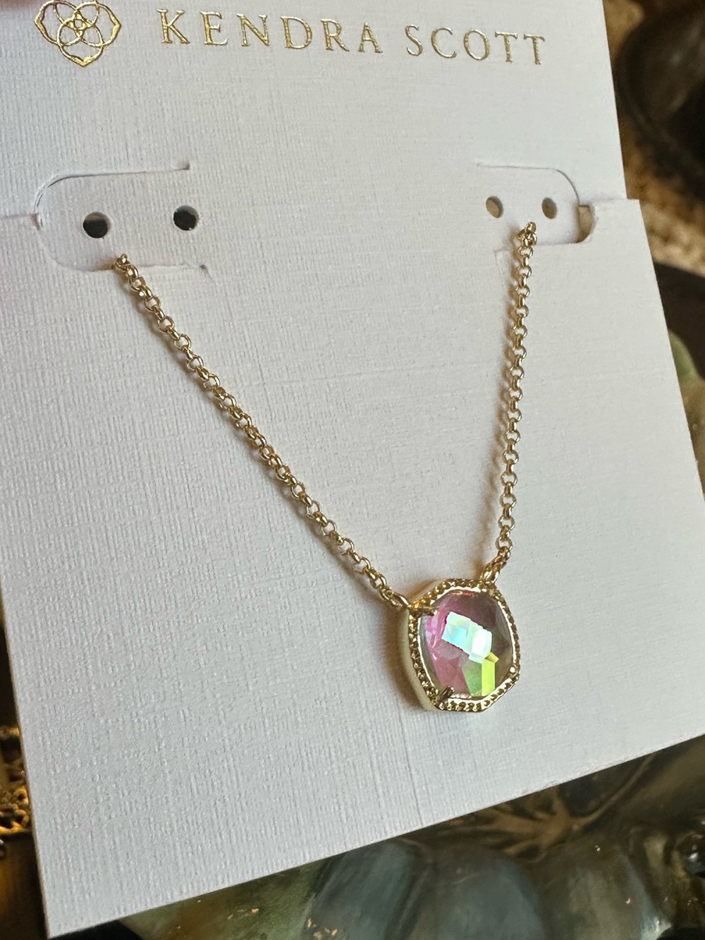 Kendra Scott Davie Pendant Necklace, featuring a sparkling, iridescent dichroic